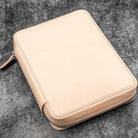 Natural undyed leather zippered case on a dark textured surface