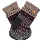 Pair of patterned mittens with a brand label on a white background