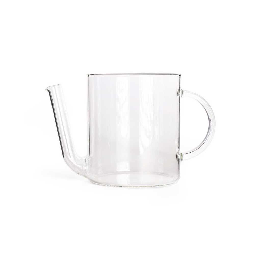 Glass fat separator for cooking with spout on white background