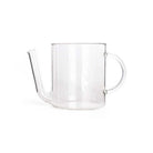 Glass fat separator for cooking with spout on white background