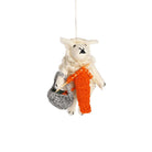 Felted sheep ornament with knitting accessories.