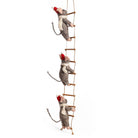 Three felted mice on ladder ornament on white background.