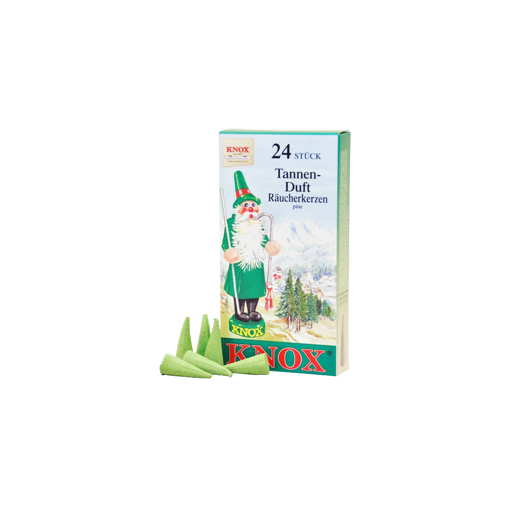 Box of KNOX fir incense next to green incense cones on white background