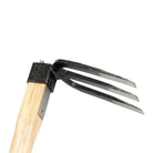 Three pronged forked hand hoe gardening tool with wooden handle on white background