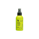 Yellow bottle of face toner with black spray nozzle on a white background