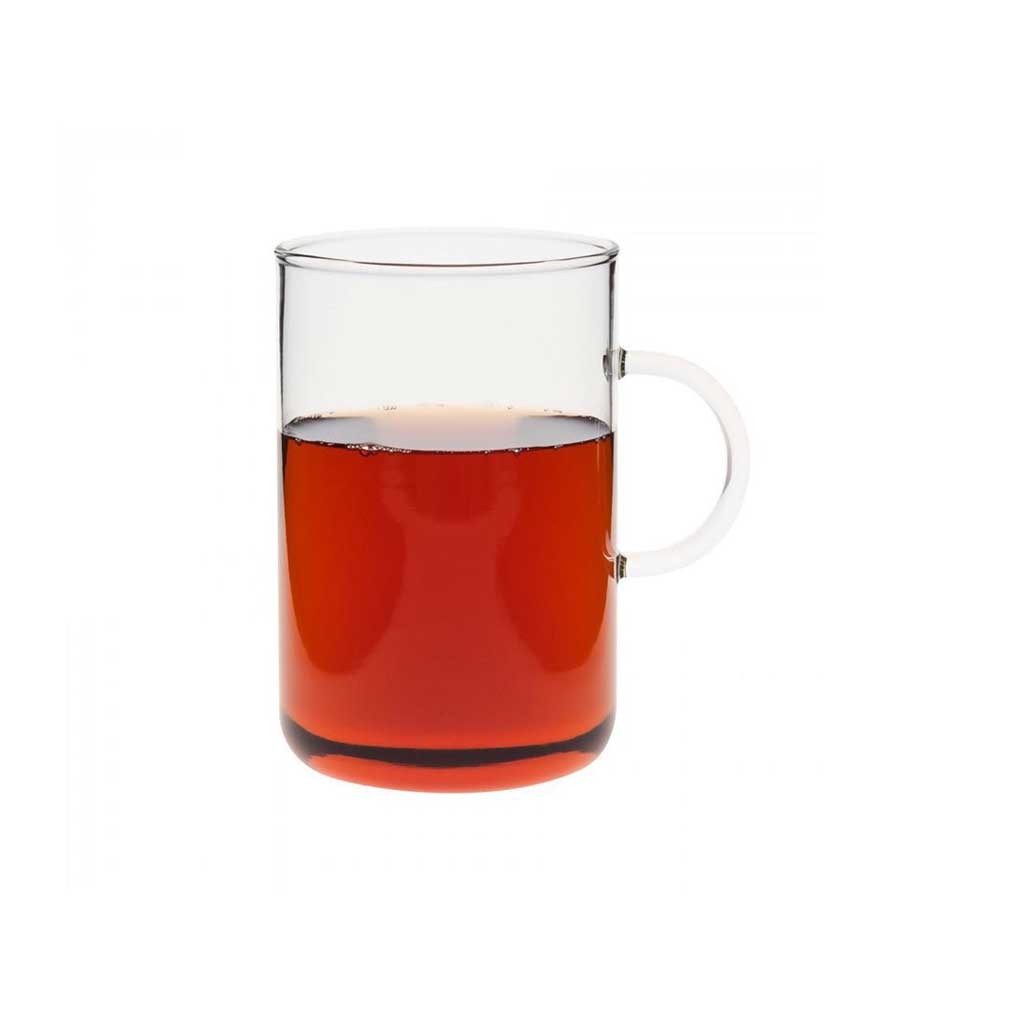 XL glass mug with amber drink on white background