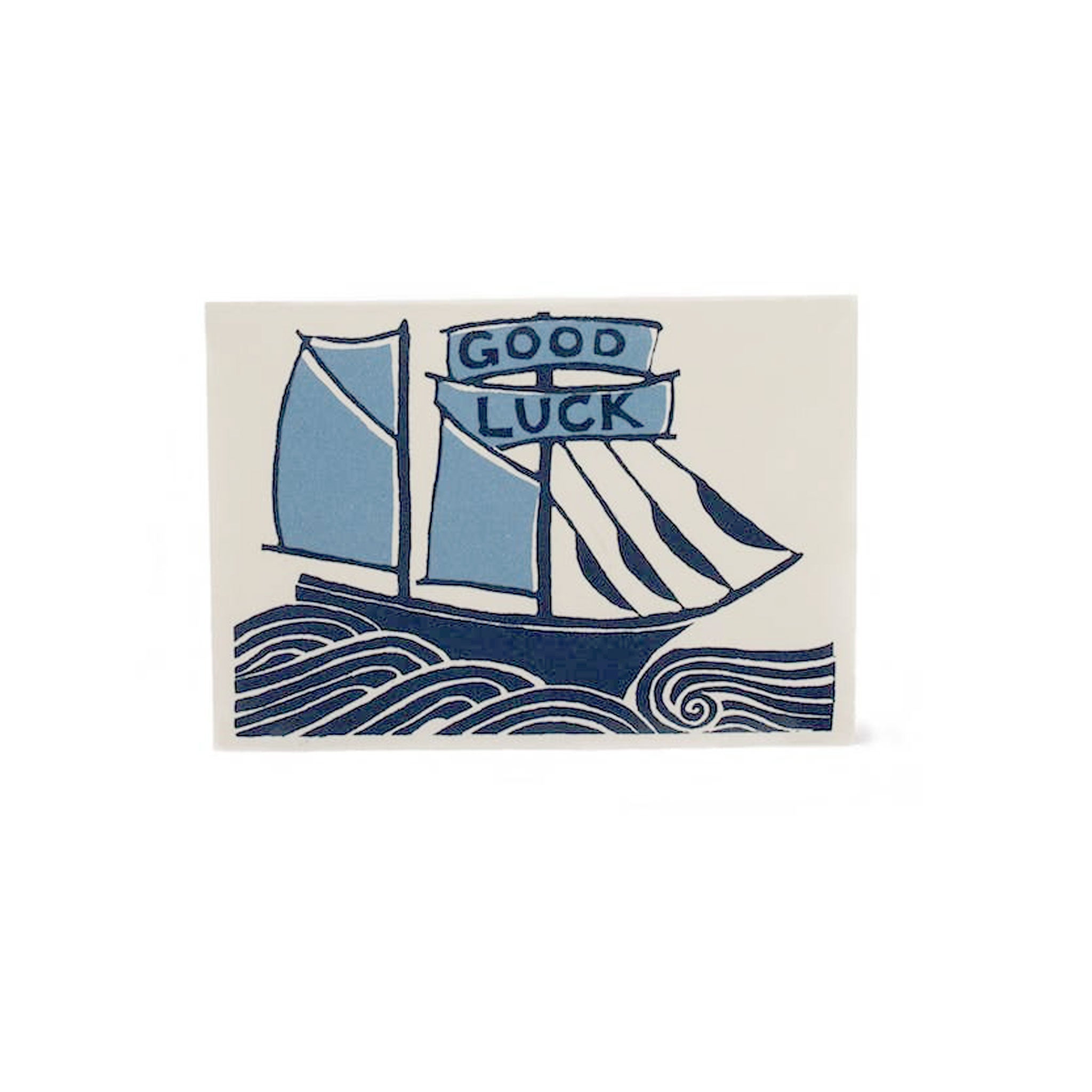 greeting card featuring a sailboat with good luck written in the sails
