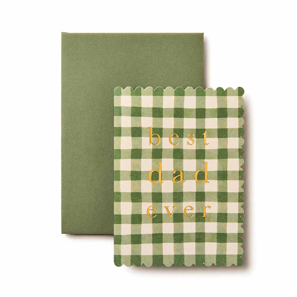 A Father's Day greeting card with green gingham pattern and the text 'best dad ever' on the front, accompanied by a green envelope.