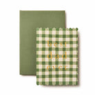 A Father's Day greeting card with green gingham pattern and the text 'best dad ever' on the front, accompanied by a green envelope.