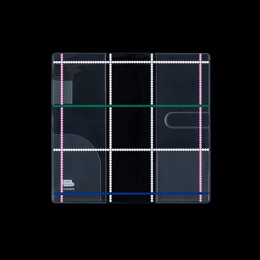 Clear Hobonichi Weeks clear cover with colorful dotted plaid pattern against black background