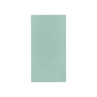 A mint green graph paper notebook with a fine grid pattern, shown flat against a solid white background.