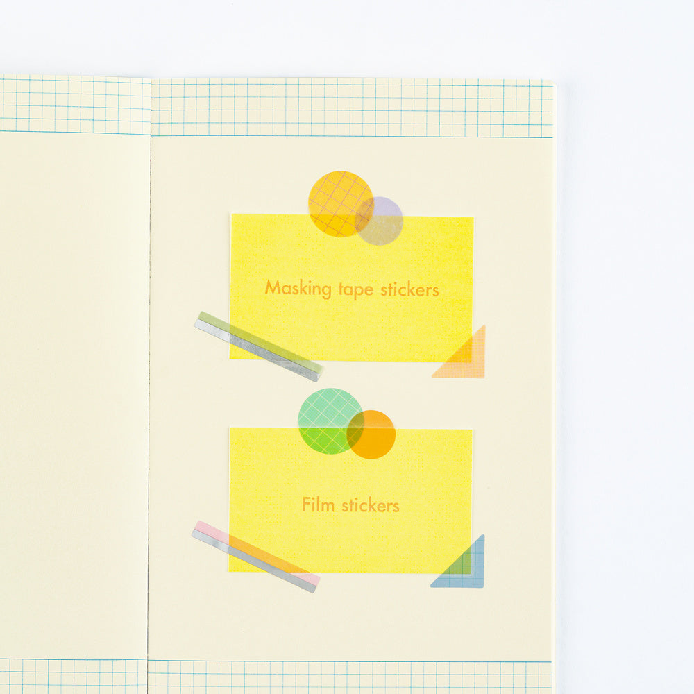 A close-up of a stationery page showing two yellow sticky note-style labels with printed text reading 'Masking tape stickers' and 'Film stickers,' decorated with overlapping colored geometric-shaped patterned stickers.