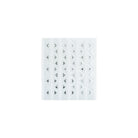 A sheet of collect & collage 'Pocket' adhesive stickers, featuring various geometric and arrow designs on a white sheet.