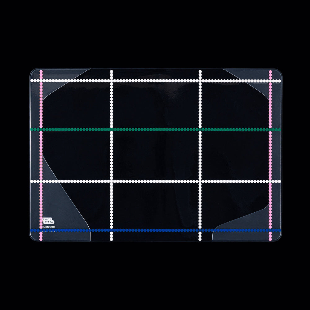 Clear cover for A5 Hobonichi Techo cover with colorful dotted plaid pattern against black background