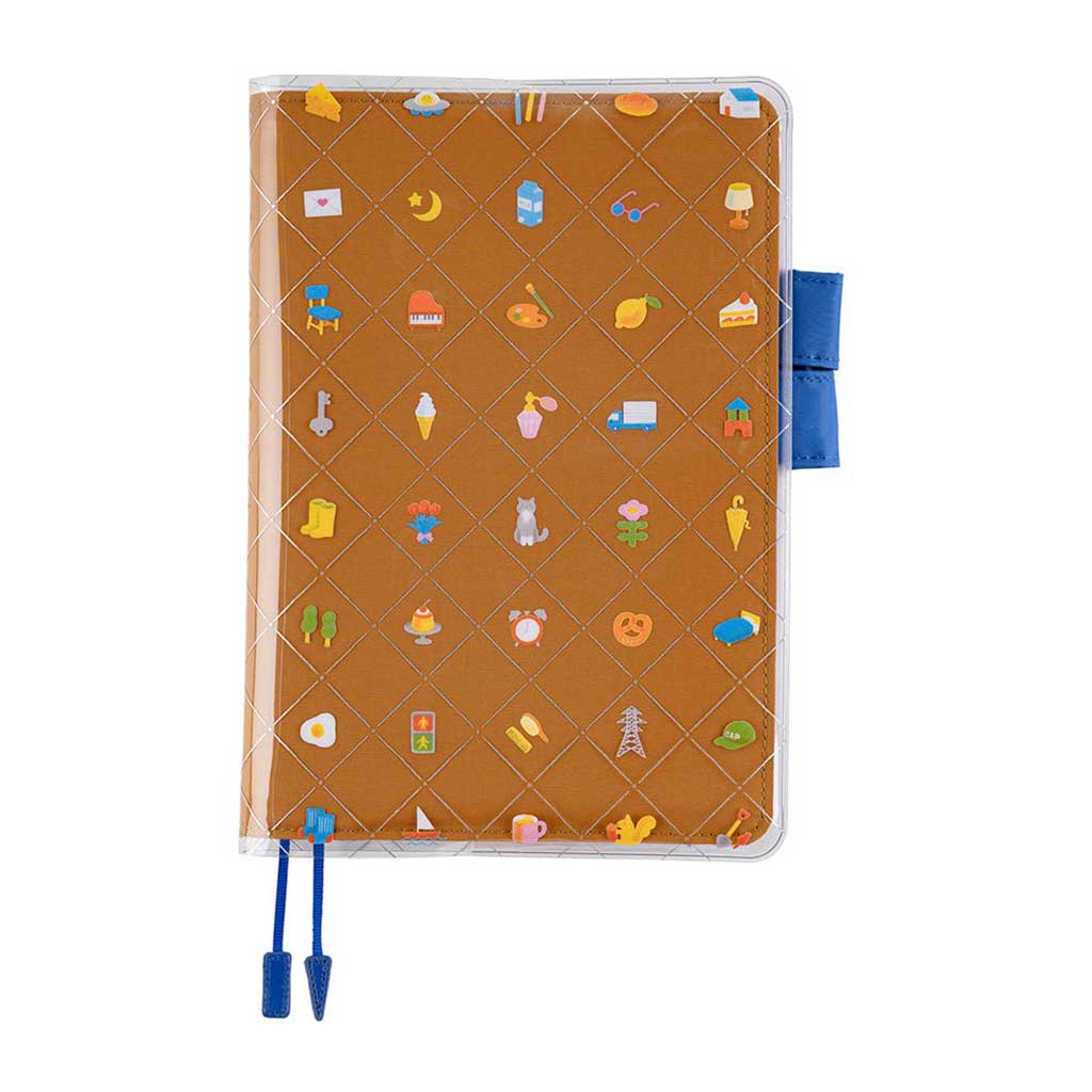 Clear cover on cover with colorful object design on top of brown fabric cover for Hobonichi Techo Cousin A5 planner on white background