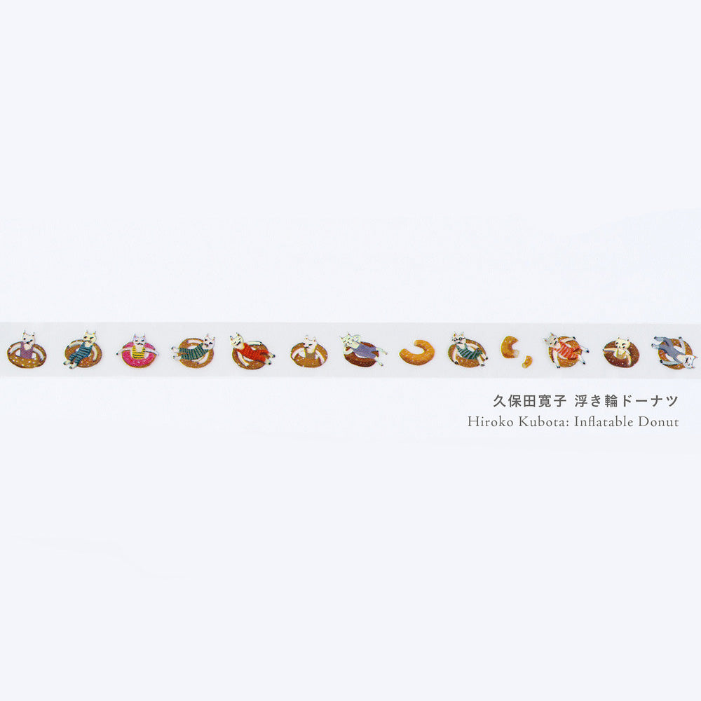 A long strip of decorative tape featuring a repeating row of cats in colorful inflatable donut illustrations, shown against a plain white background with Japanese text and 'Hiroko Kubota: Inflatable Donut'.