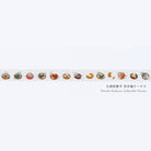 A long strip of decorative tape featuring a repeating row of cats in colorful inflatable donut illustrations, shown against a plain white background with Japanese text and 'Hiroko Kubota: Inflatable Donut'.