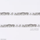 Strips of Deco Rush tape with black Hattifattener character design from Moomin series on white background