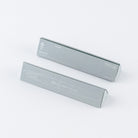 Two triangular light gray boxes for fountain pen on white background
