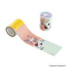 A roll of Moomin-themed sticky notes shown partially unrolled next to its cylindrical packaging. The roll features a tri-color design of yellow, peach, and mint green with illustrations of Moomin characters.