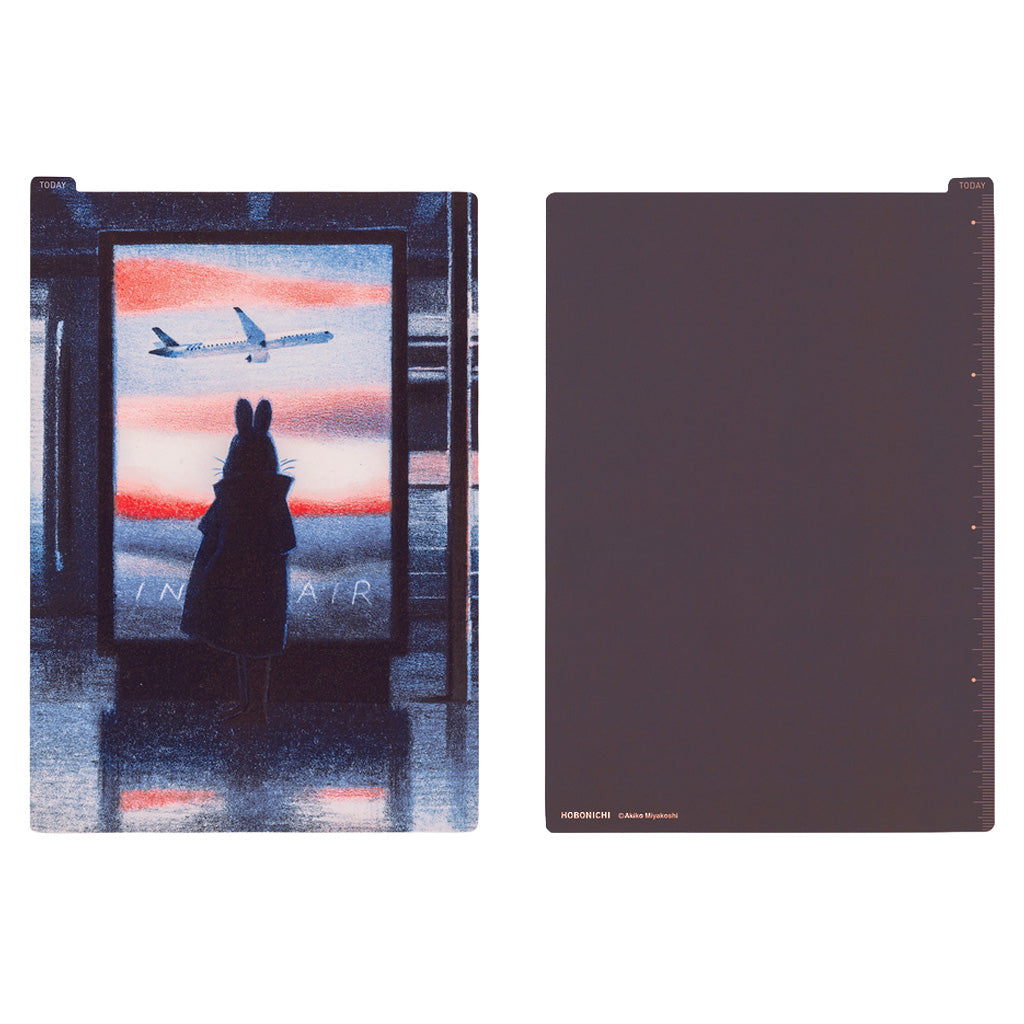 Front and back of a rectangular pencil board for A5 Techo. The front design has a rabbit figure in front of airport window with colorful sunset, and the back is a plain dark purple. 