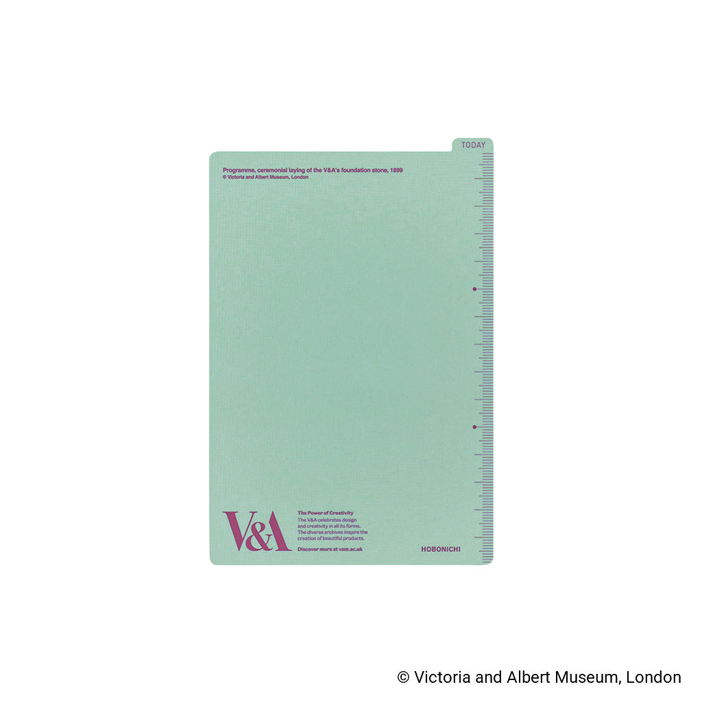 A mint green A6-sized pencil board with the V&A logo in purple text and small measurement markings along the right edge against a white background