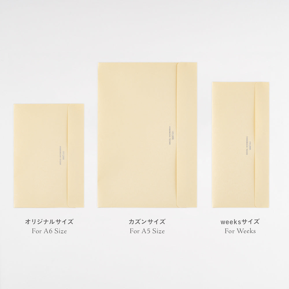 Three cream-colored paper envelopes of different sizes arranged side by side on a white background, with Japanese and English size labels underneath.