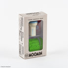 Moomin character rubber stamp in its packaging, featuring a white holder with a blue cap and a green textured stamp, visible through a clear plastic window on a light gray box.