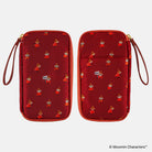 Front and back of a red zippered pouch featuring an all-over repeating print of Moomin Character Little My, including a wrist strap and gold-tone zipper.