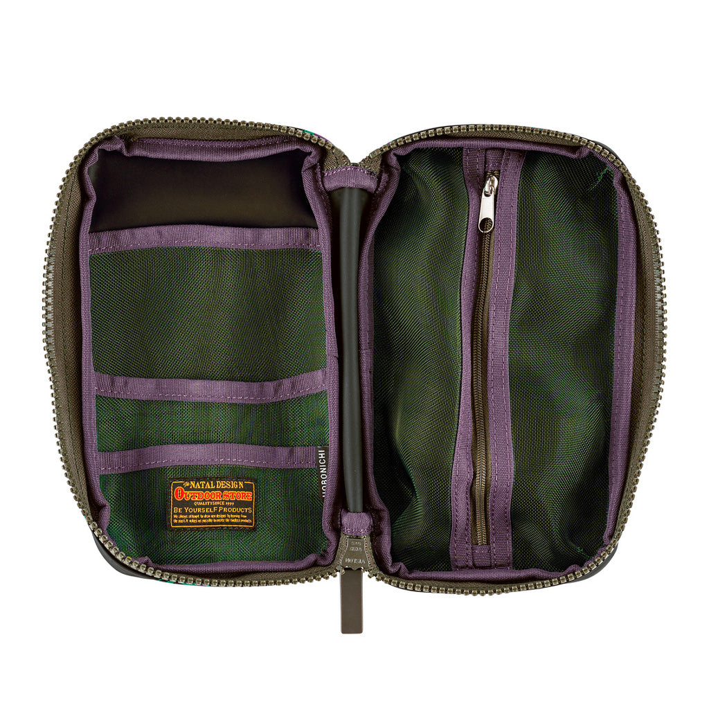 An open zippered case shown from above, with olive green exterior fabric, purple interior trim, and a dark green interior. The left side has two mesh pockets, and the right side has a vertical zip compartment.