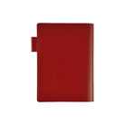 Red A6 leather cover for 5-year journal on white background