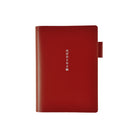 Red A6 leather cover for 5-year journal on white background