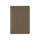 Warm gray leather cover for A5 Cousin Hobonichi Techo planner on white background