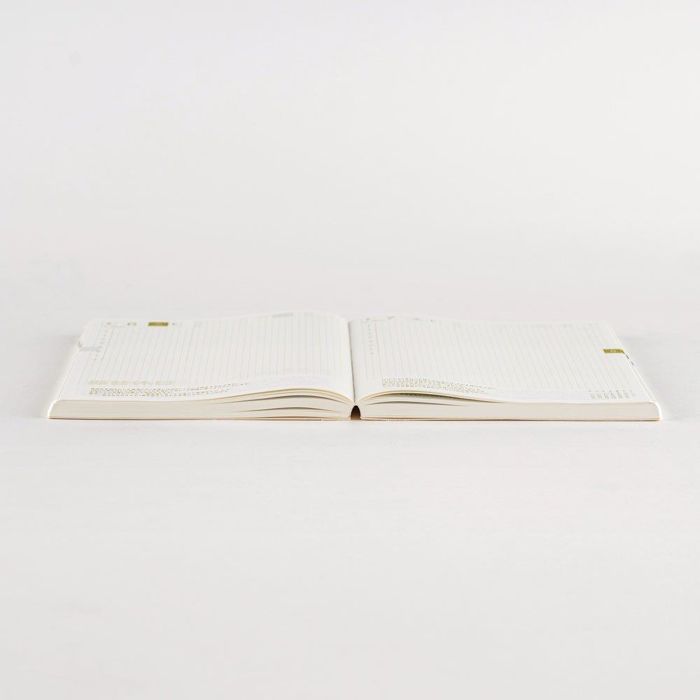Open Hobonichi Techo 2026 Cousin A5 Spring Start planner laying flat on white surface