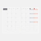 An open A5 Hobonichi Techo 2027 Cousin planner book with monthly spread for November 2027 on white background
