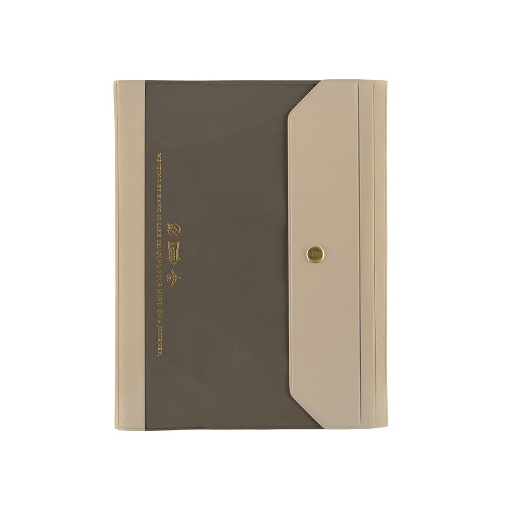 A warm gray and taupe Hobonichi Techo Alettone planner cover with a tri-fold design, exterior pocket, and gold snap button on a plain white background.