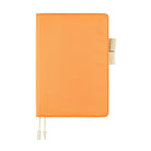 Pastel orange colored Hobonichi Techo cover with contrast ivory white pen loops, and two ribbon bookmarks with tabs shown on a plain white background.