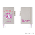 Two views of a Moominpappa at Sea journal cover on a white background. The left view shows the front cover with a pink illustration of Moominpappa  along with a quote and the right view shows the back cover with a pink embroidered landscape. 