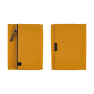 Front and back mustard yellow Hobonichi Tragen tri-fold covers with a vertical zippered pouch and black zipper pull shown side by side on a plain white background.