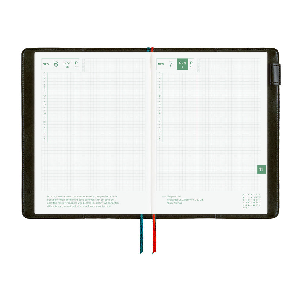 An open weekly planner featuring white grid pages, and colored ribbon bookmarks in red and blue, shown on a plain white background.