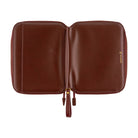 A brown leather notebook or document case shown open against a plain white background, featuring a small gold 'hobonichi' logo on the right side.