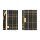 Two views of a zippered pouch or notebook cover in a dark green and tan plaid pattern with light blue lines, shown on a plain white background.