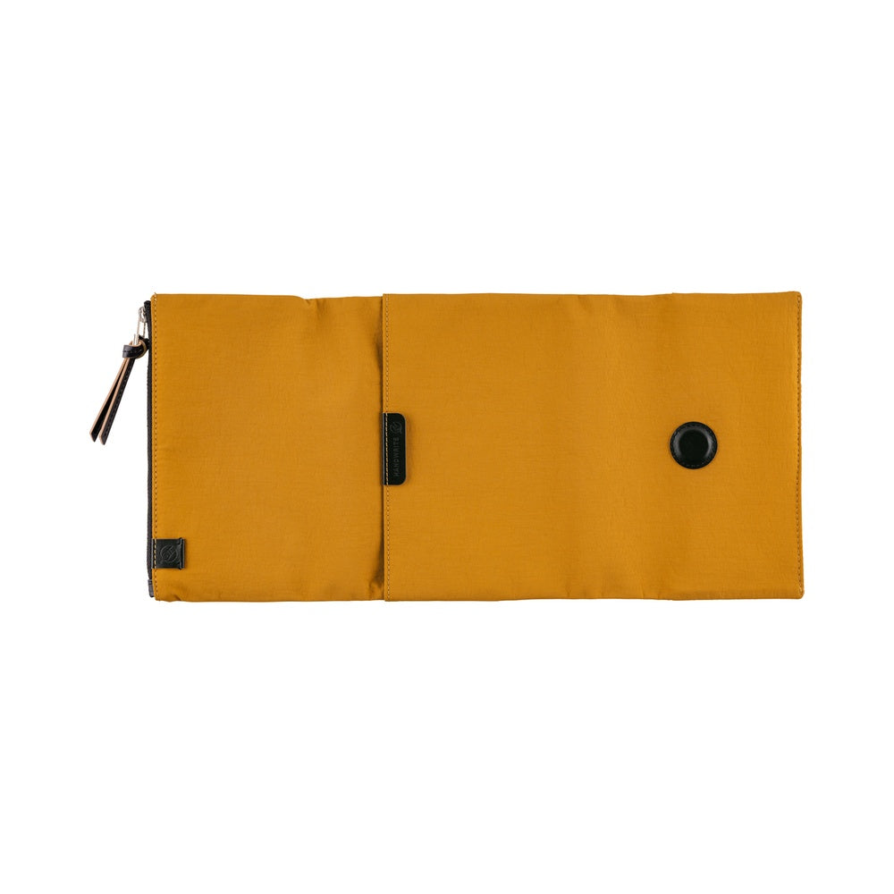 Yellow pouch with a black zipper and button on a white background