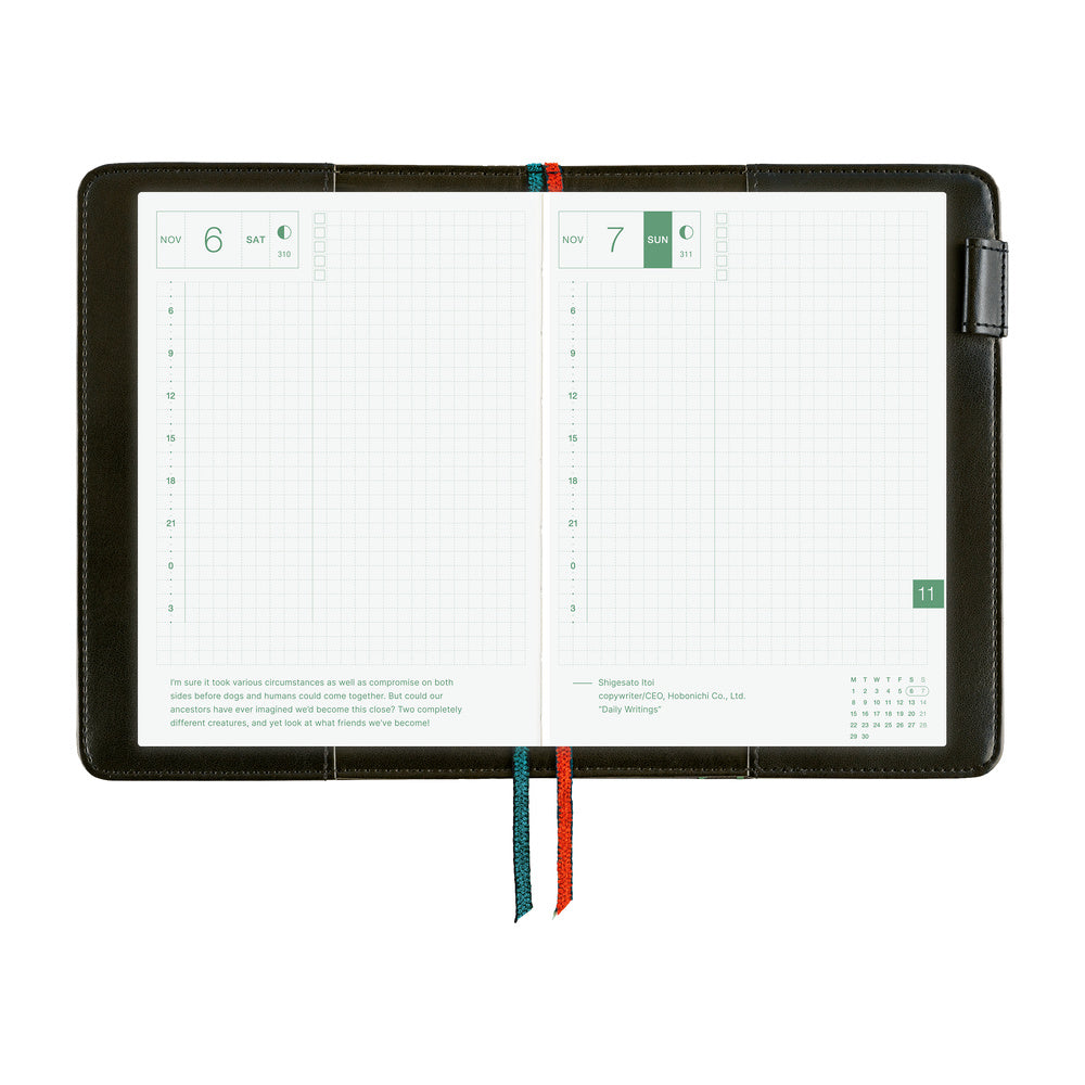 A black tablet-style planner or digital calendar display shown open on a white background, with two grid pages visible and two ribbon bookmarks in teal and red hanging from the bottom.