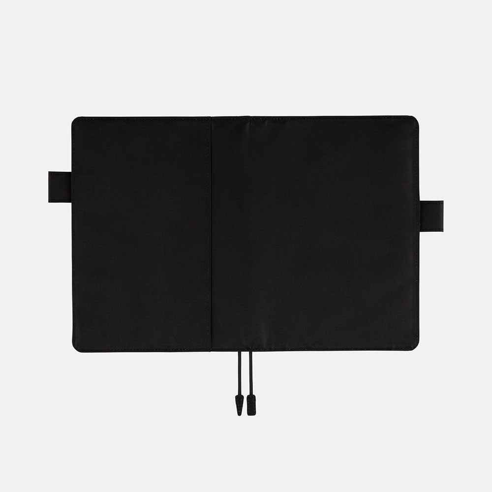 Black Hobonichi A5 cover with pen loops and bookmark on white background