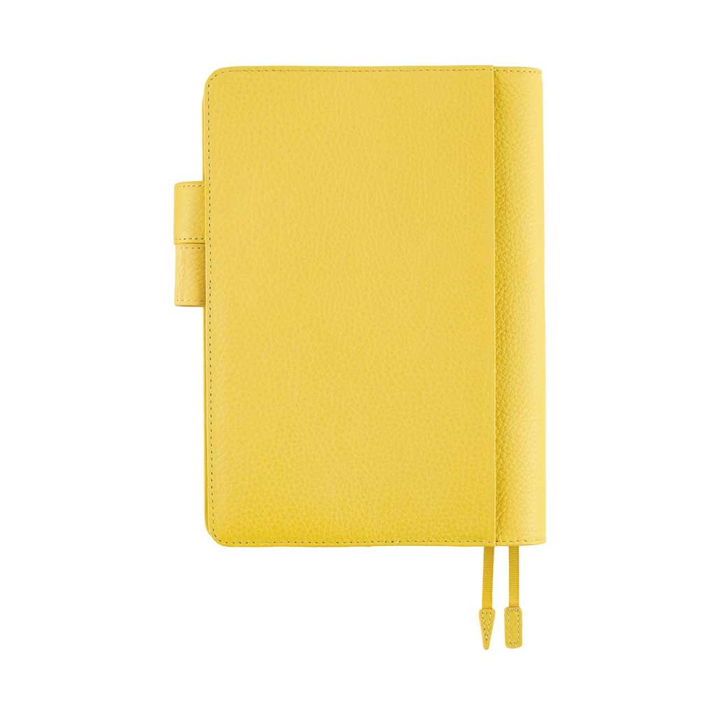 Back of yellow leather cover for Hobonichi Techo Cousin A5 planner on white background