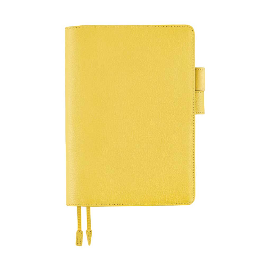 Yellow leather cover for Hobonichi Techo Cousin A5 planner on white background