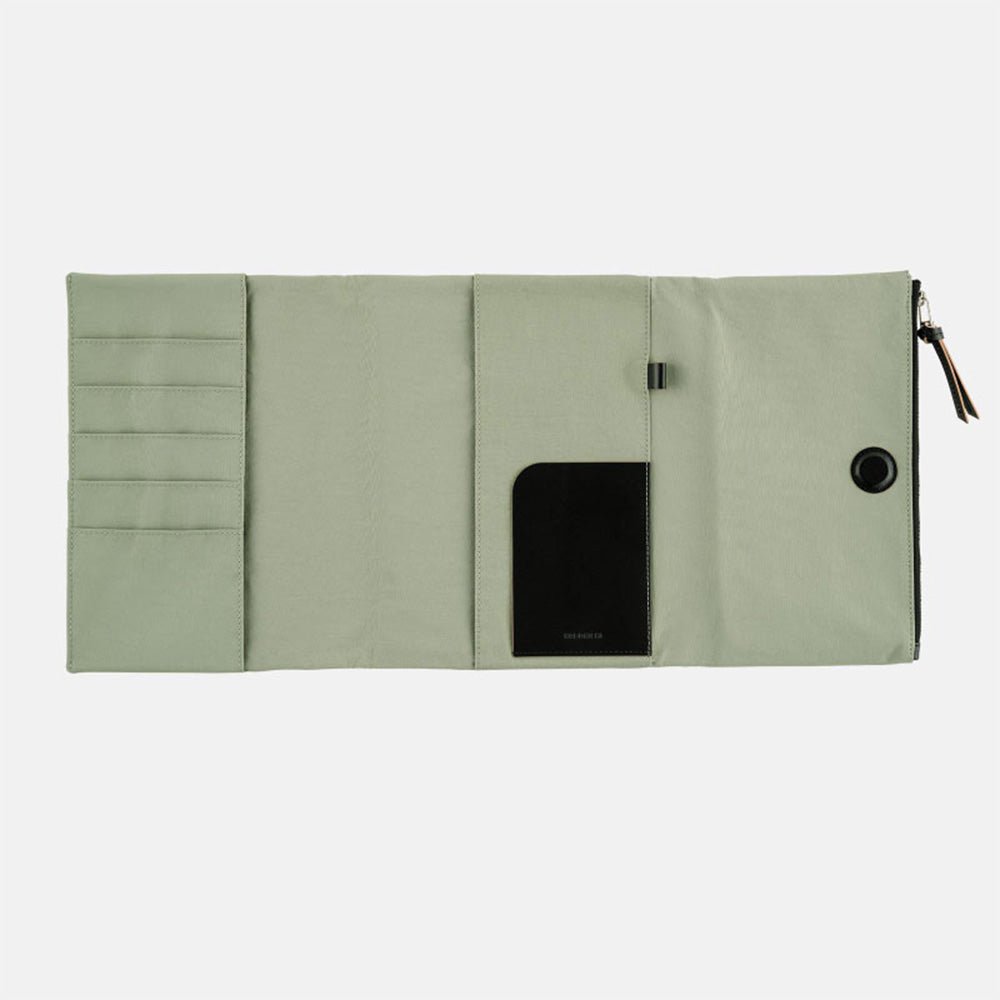 Oakmoss green fabric Tragen zippered cover for Hobonichi Techo Cousin A5 planner on white background