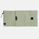 Oakmoss green zippered Tragen cover for Hobonichi Techo A6 planner on white background