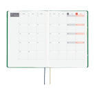 An open 2027 Hobonichi Techo HON hardcover planner showing a two-page monthly calendar layout for November, with two ribbon bookmarks hanging below on a white background.